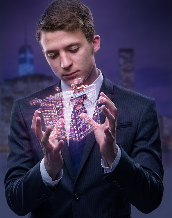 Businessman Holding Financial Cube in Business Concept